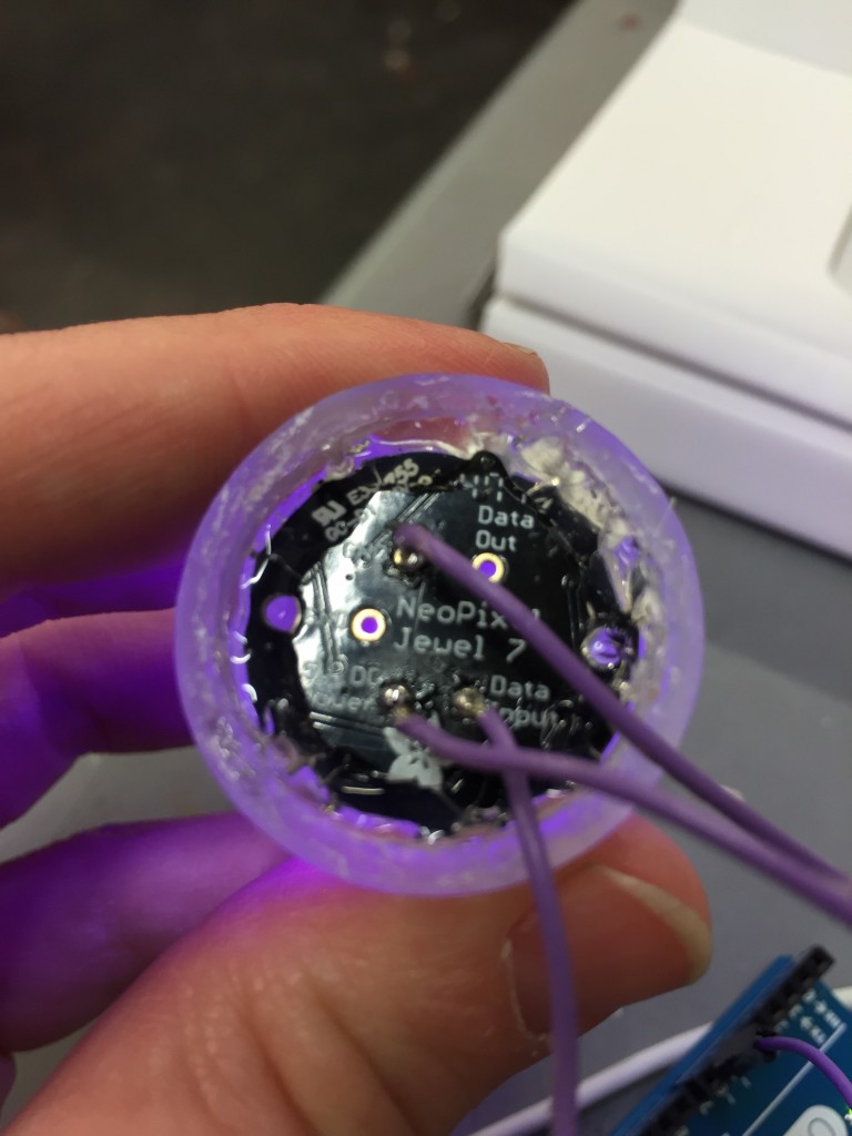 Hot glue holding the NeoPixel ring in place