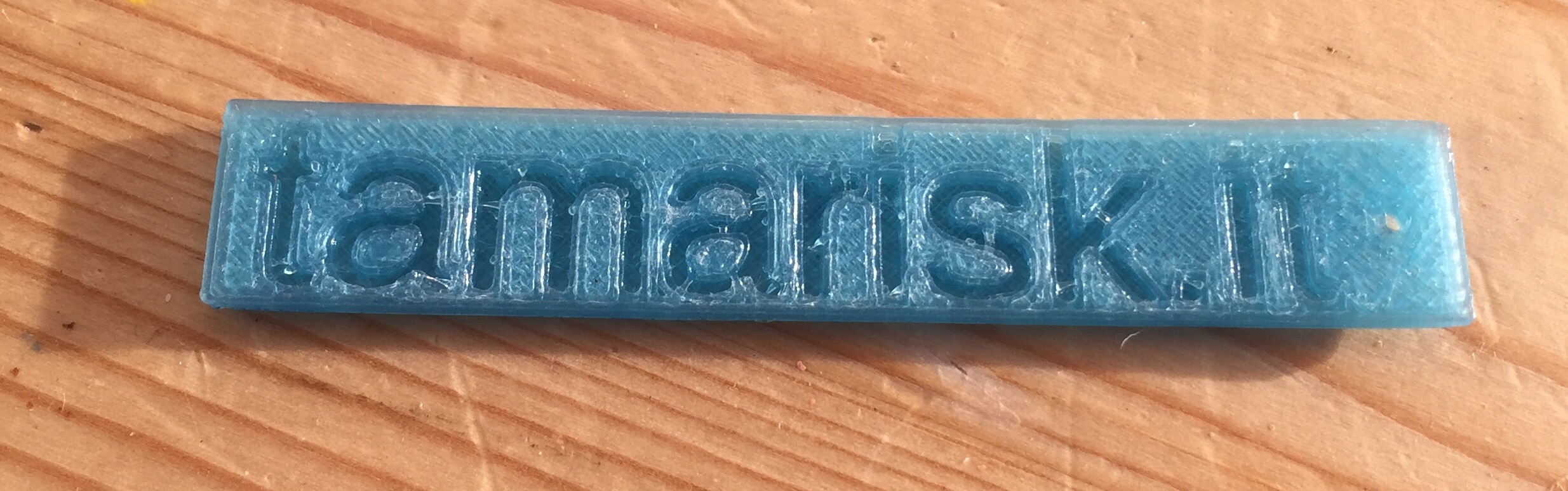 print with the extruded "tamarisk.it" embossed into it